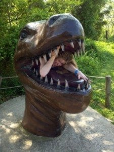 Laura being eaten by dinosaur