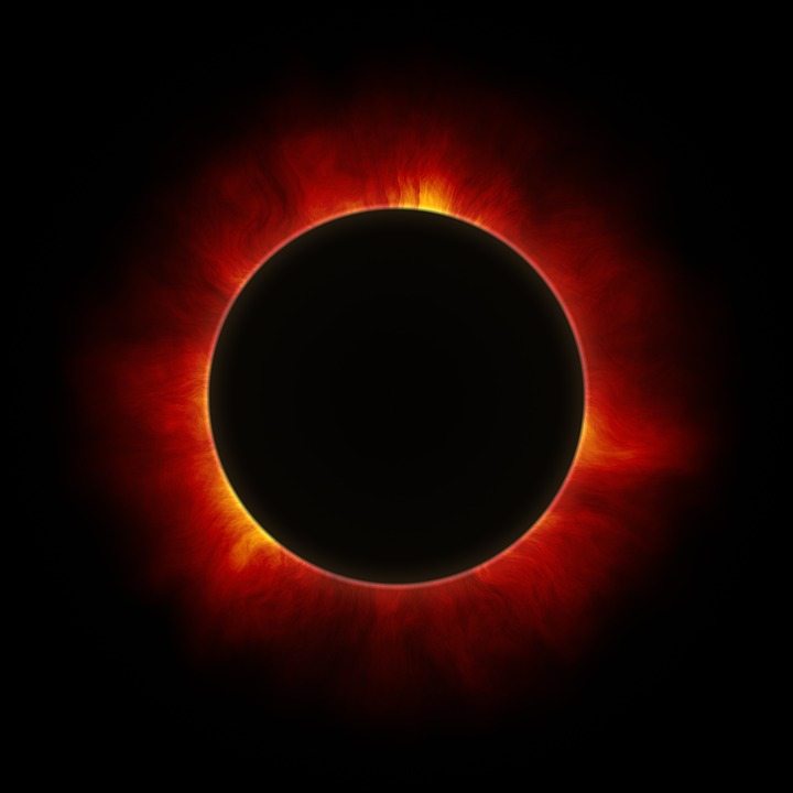 Total Solar Eclipse with fiery corona around the moon, astronomical event, space sky image.