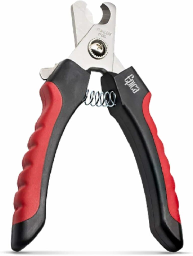 A reliable part of your pet care toolkit, this pair of red and black nail clippers features a stainless steel blade and a coil spring mechanism between the handles. Designed for comfort, the ergonomic grooves ensure an easy grip while grooming.